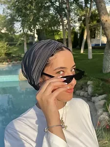 The dark grey turban